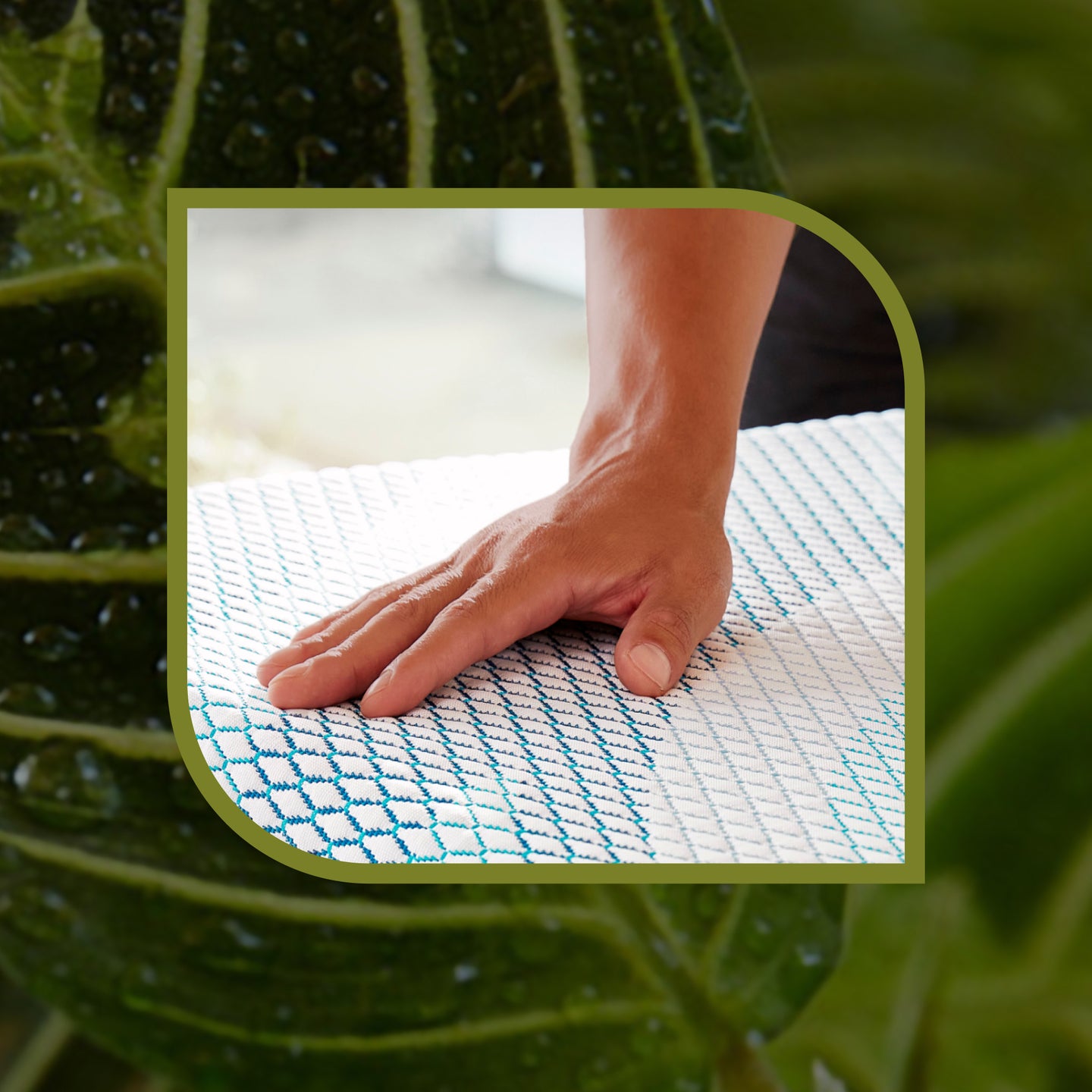 Hand touching eco-friendly material of the Serta iComfortEco mattress