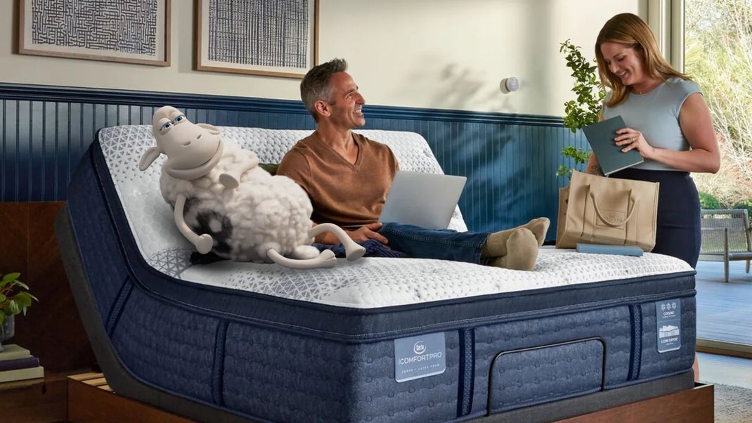 Adjustable mattress with plush sheep toy