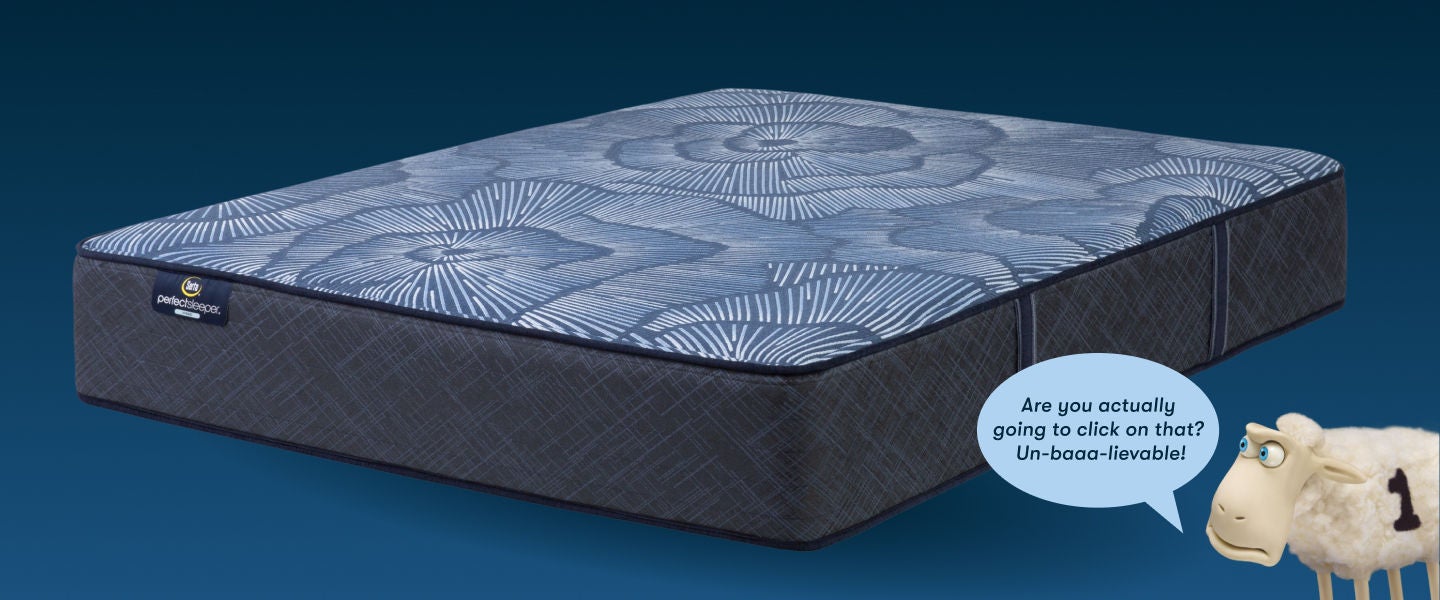 Perfect Sleeper Mattress with a Serta Sheep on the right of the bed looking at the mattress with the caption, "Are you actually going to click on that? Un-baaa-lievable!"