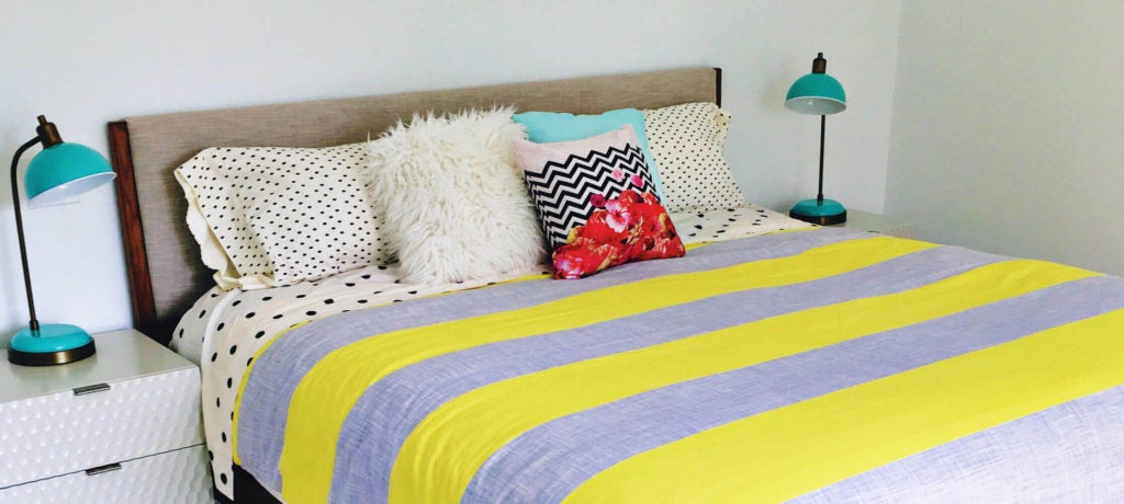 Bright bedroom with colorful bedding