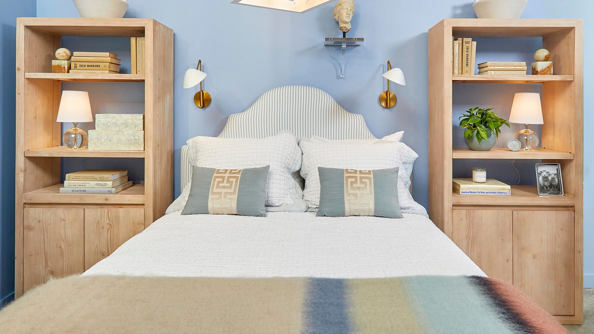 Cozy Bedroom with Wooden Shelves