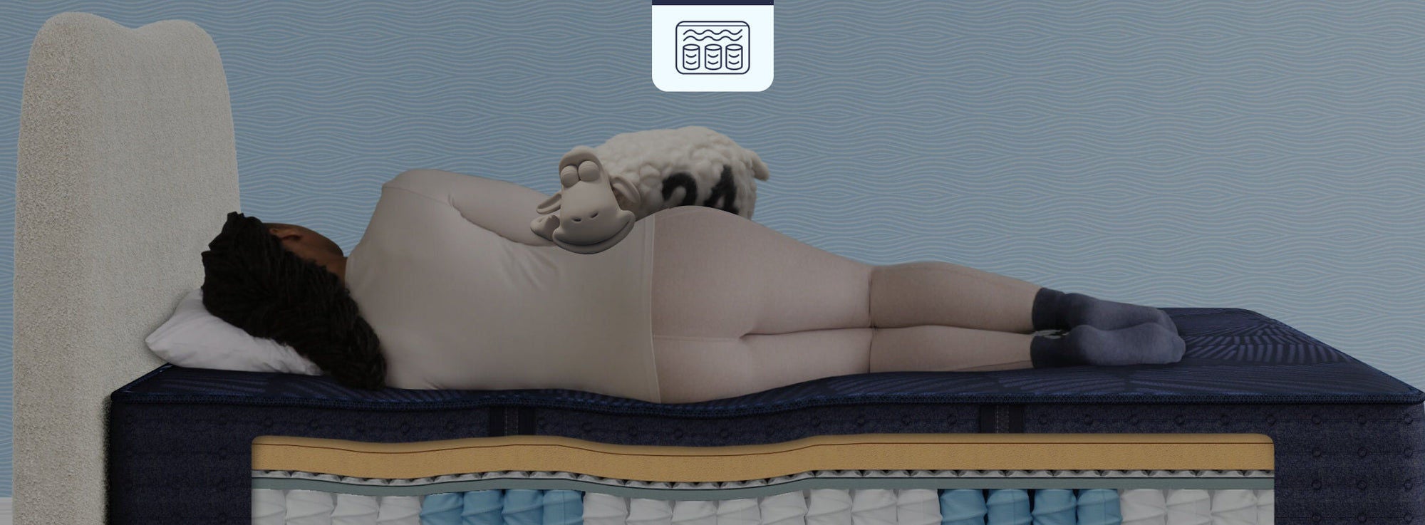 Woman sleeping on layered mattress design