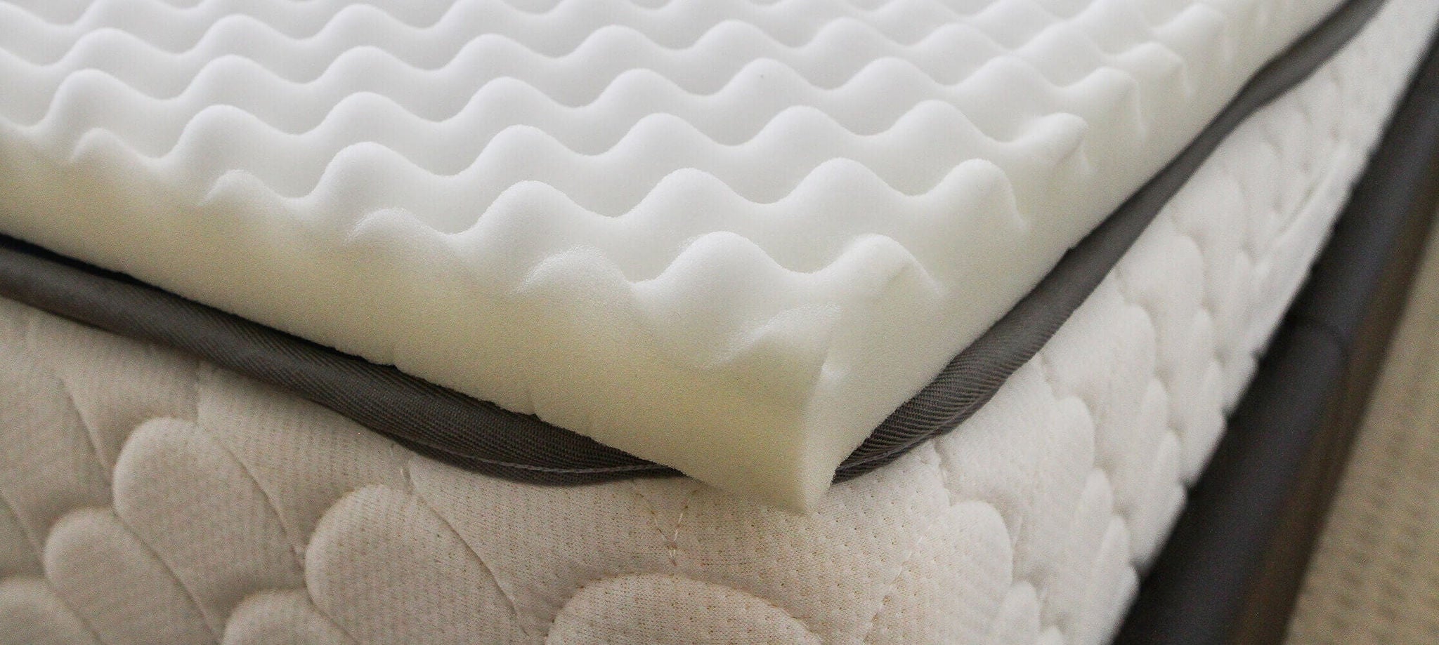 Foam Mattress Topper on Quilted Bed
