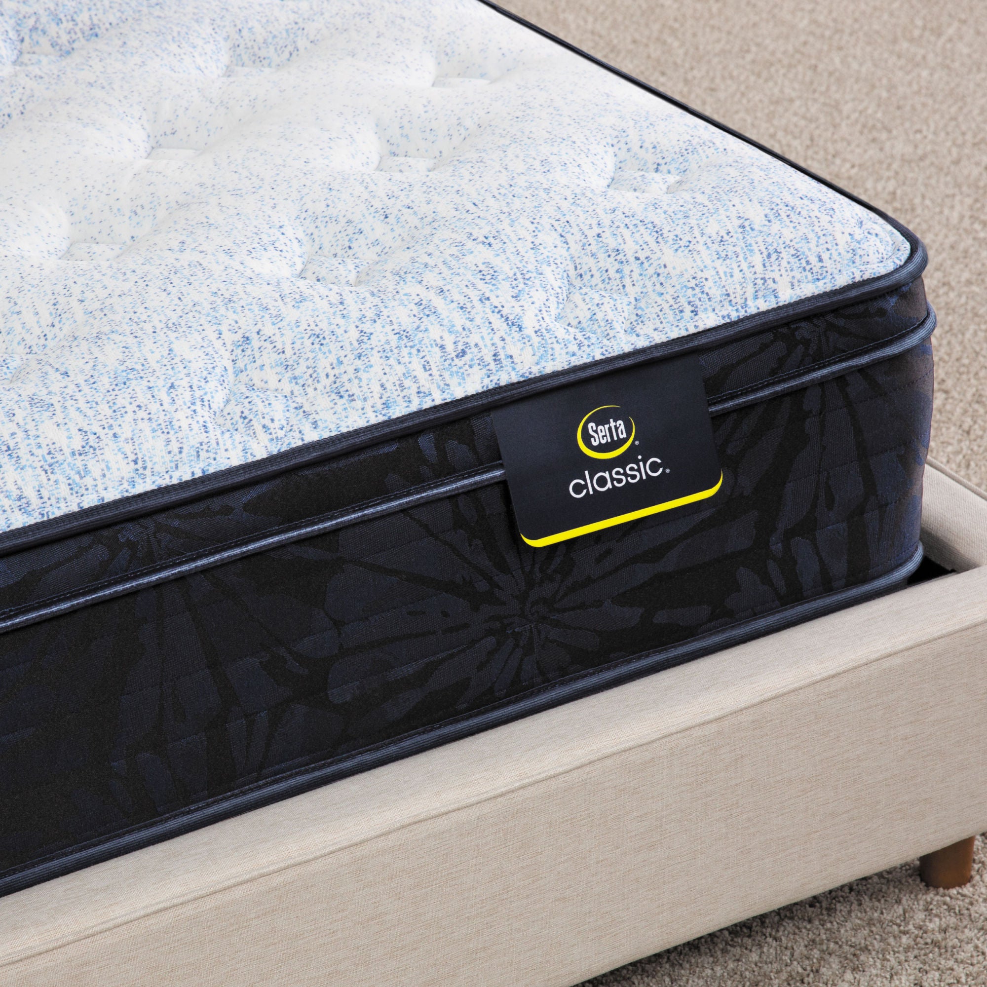 Serta Classic mattress on beige bed frame