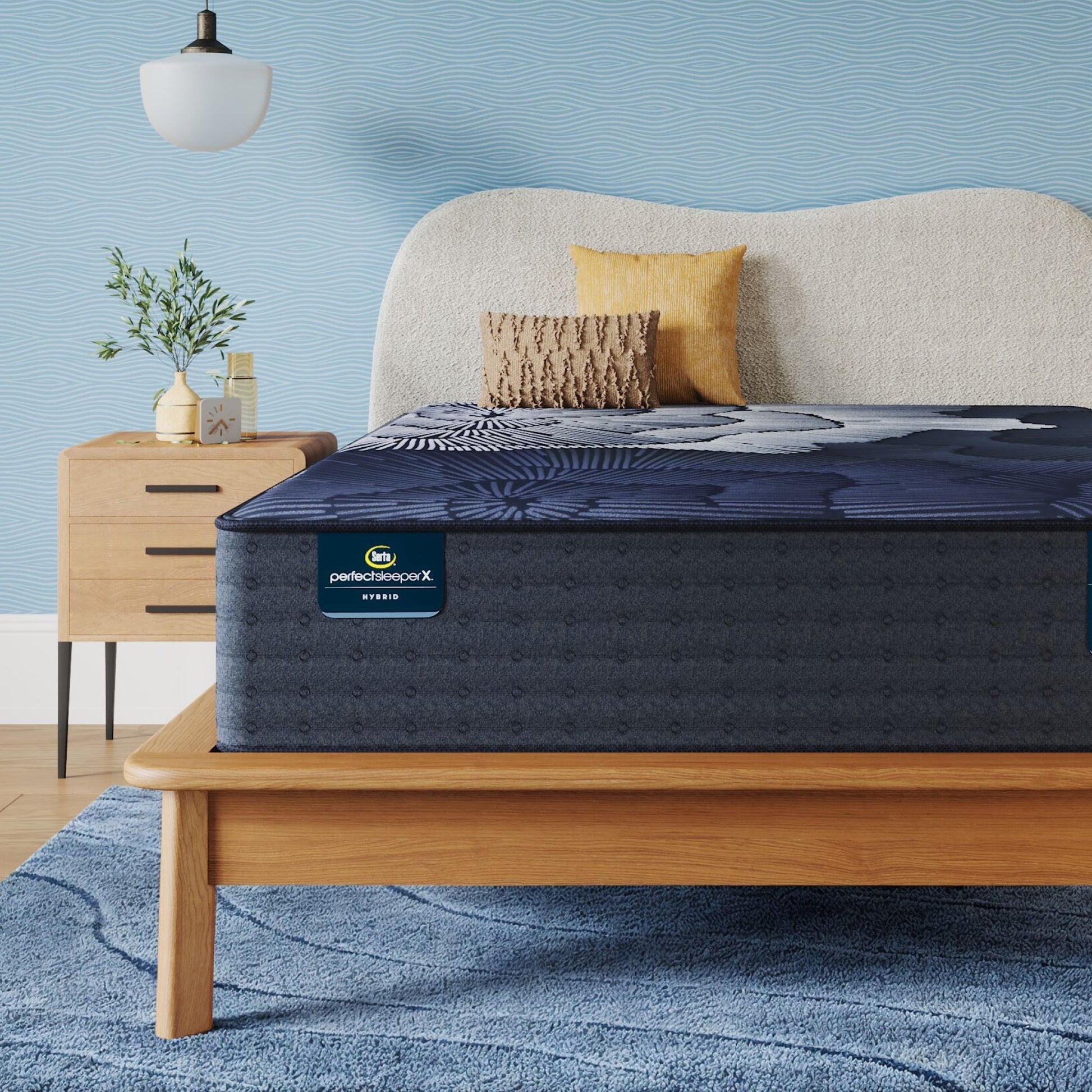 Perfect Sleeper X Hybrid Prescot Plush Mattress sitting in a brown bedframe || feel: Plush || level: Level 2