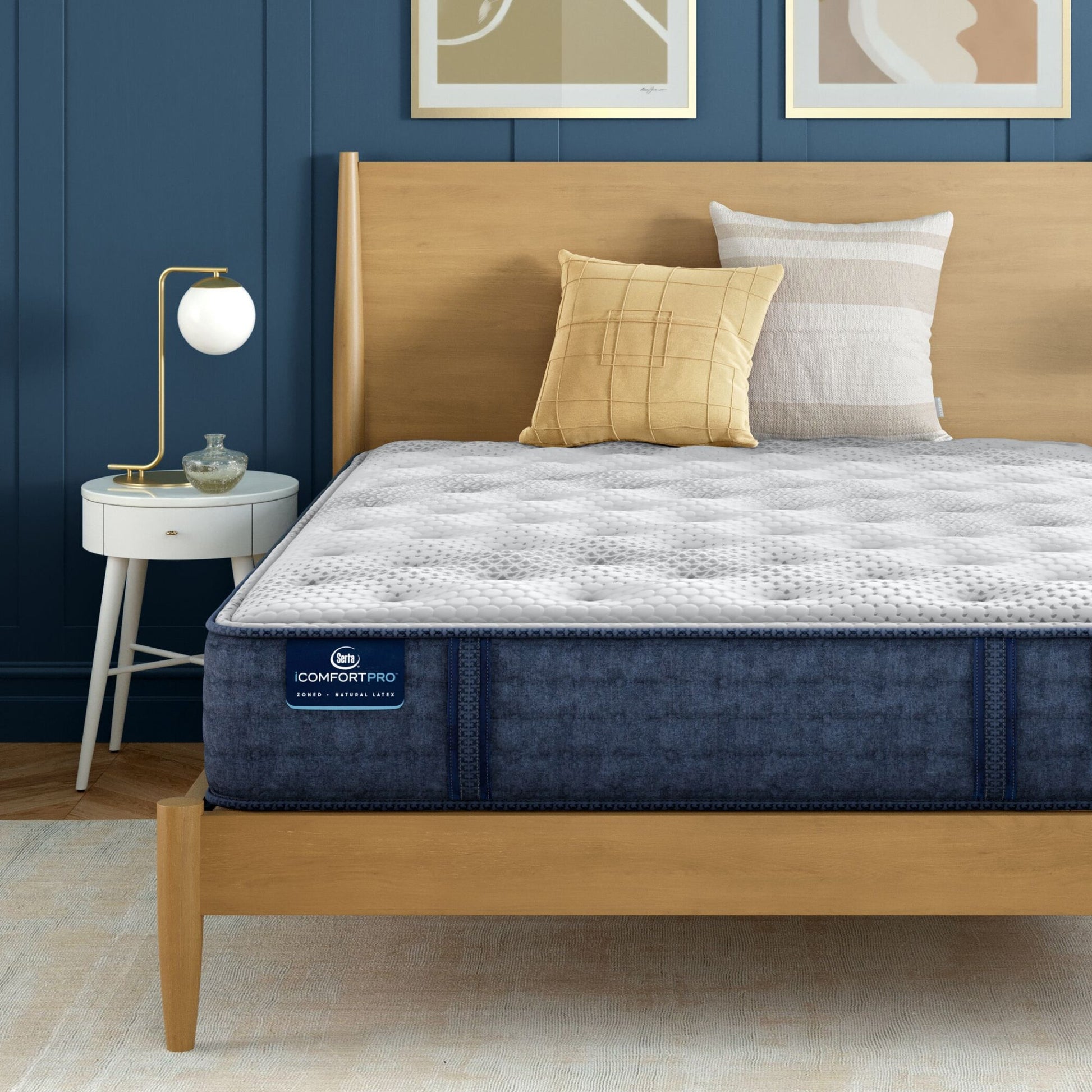 iComfortPro Chelsea Medium Mattress sitting in a brown bedframe || feel: medium || level: Level 1