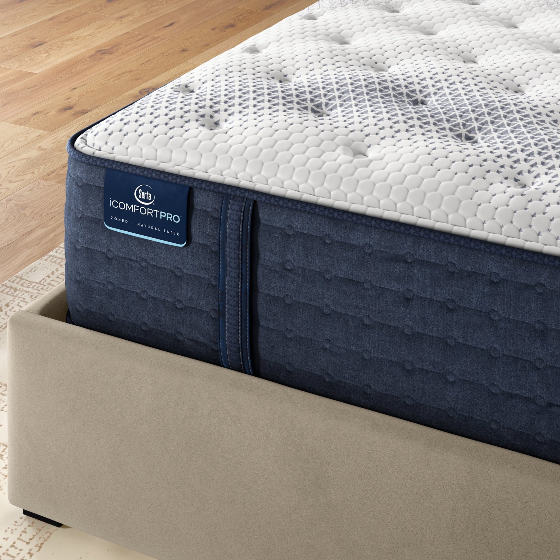 Corner of iComfortPro Canterbury Plush Mattress sitting in a brown bedframe || feel: Plush || level: Level 3