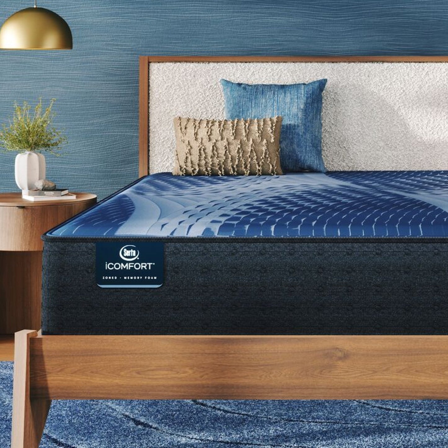 iComfort Aspire Plush Mattress sitting in a brown bedframe || feel: plush || level: Enhanced - 14"