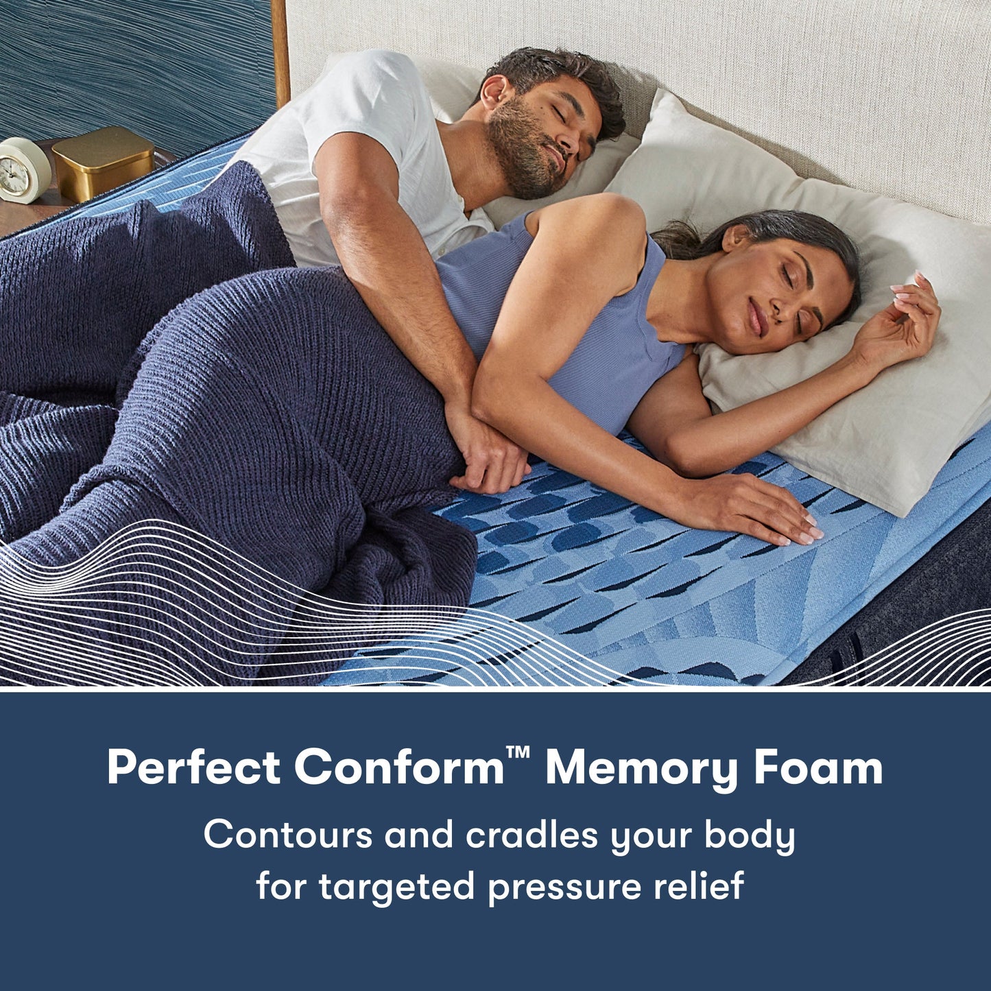 Man and woman laying on a Serta iComfort mattress on their right side || feel: medium || level: Enhanced - 14"