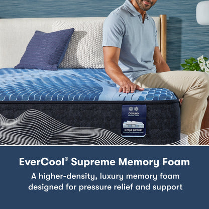 Man sitting on the right side of a Serta iComfort mattress || feel: medium || level: Enhanced - 14"