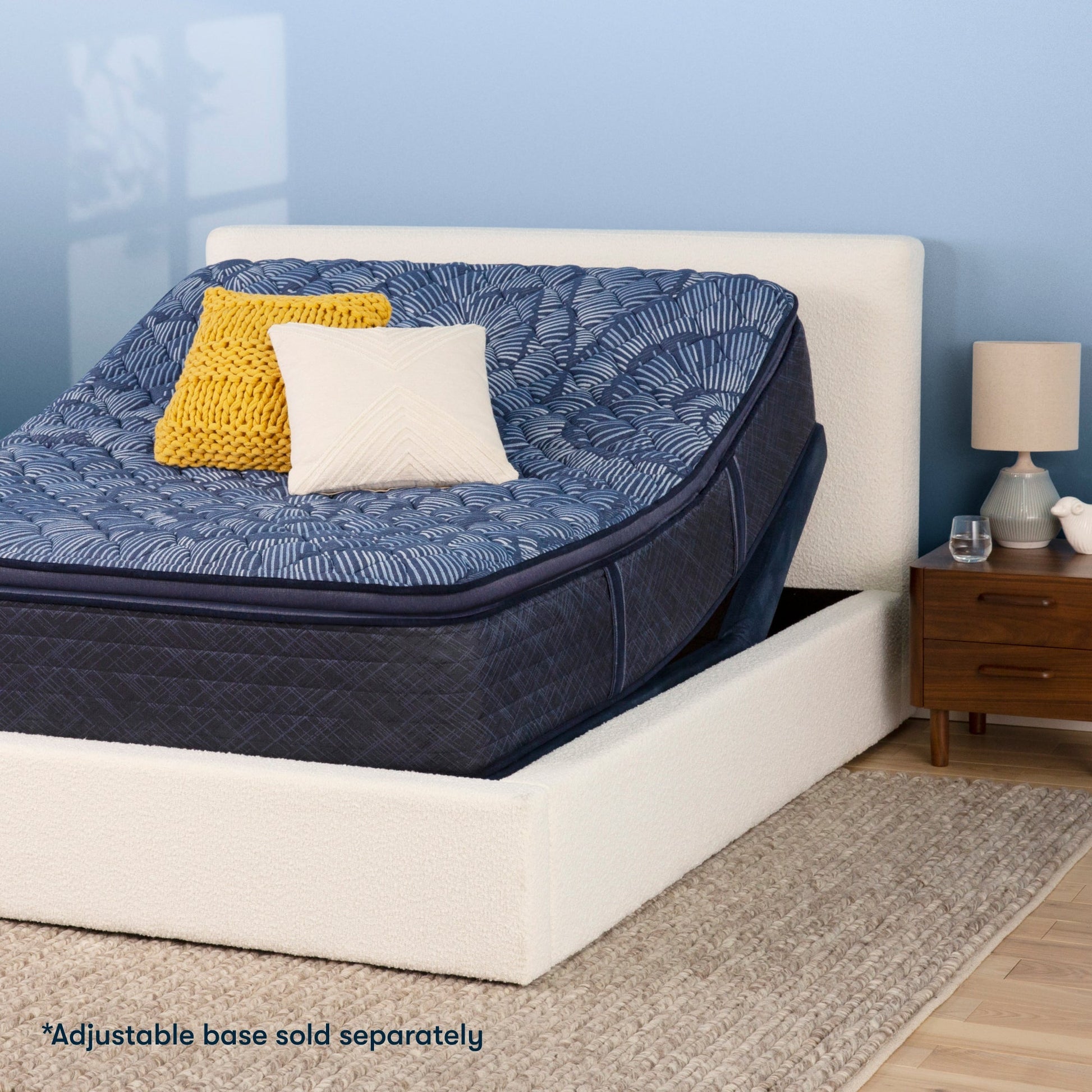 Serta Perfect Sleeper mattress with adjustable base on a beige bed||feel: plush||level: ultimate