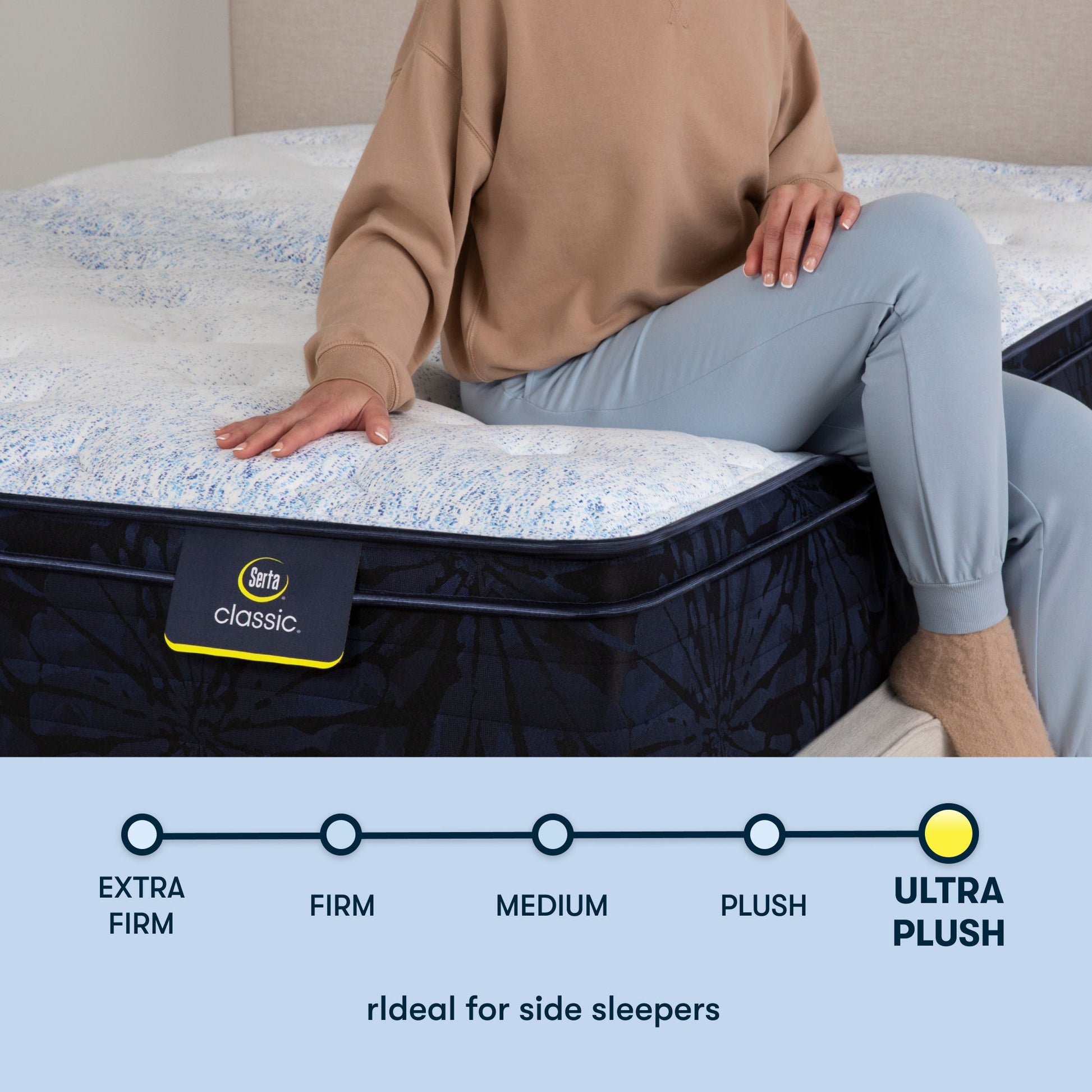 Woman sitting on a Serta classic plush euro top mattress with her right hand placed on the mattress ||feel: plush euro top ||level: standard