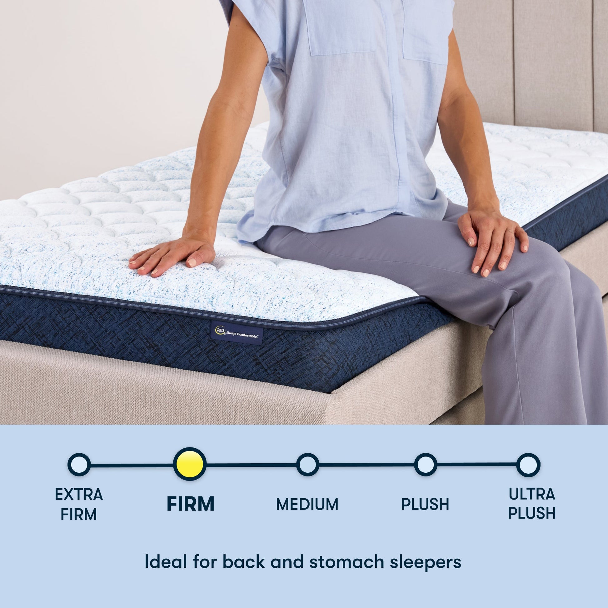 Woman sitting on the right of a 6 inch foam mattress sitting in a beige bedframe || feel: Foam (6" Profile)
