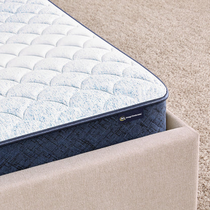 Corner of 6 inch foam mattress sitting in a beige bedframe || feel: Foam (6" Profile)