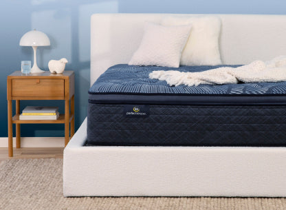 The Serta Perfect Sleeper mattress in a bedroom 