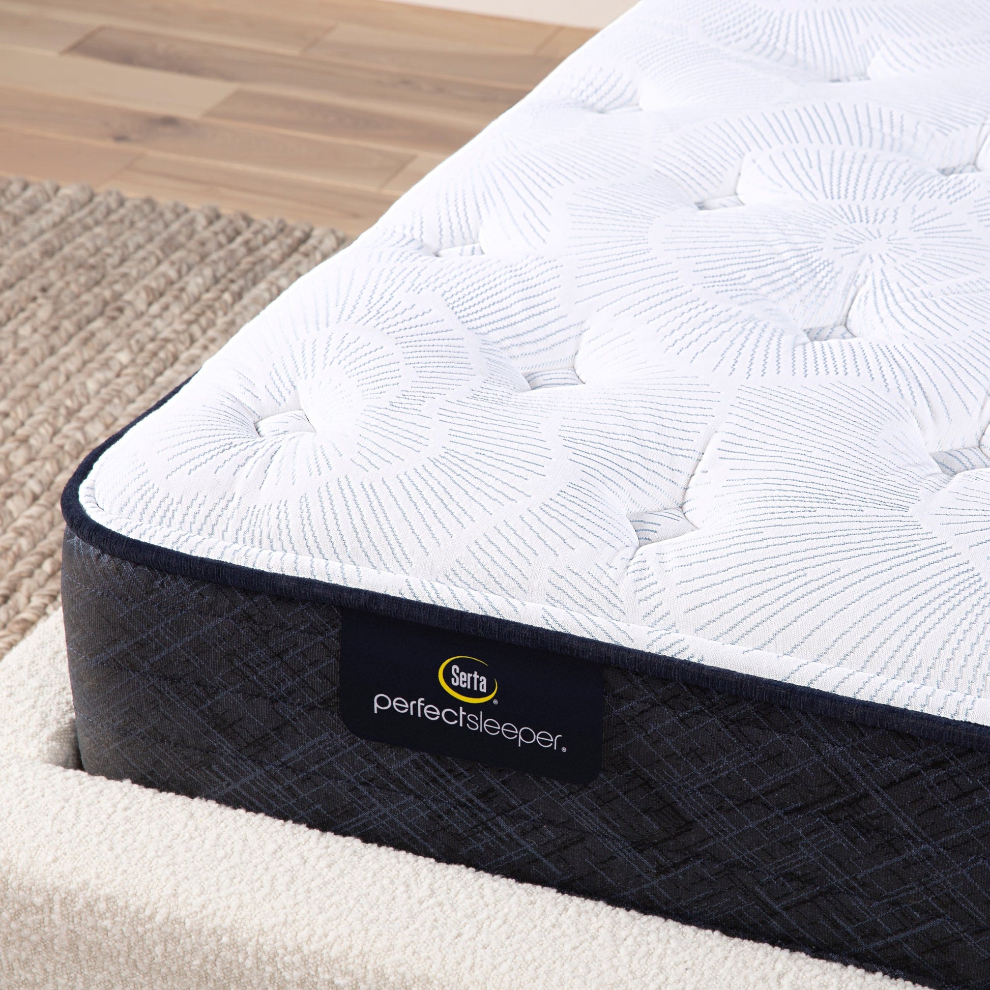 Corner detail of a Serta Perfect Sleeper plush mattress||feel: plush||level: standard