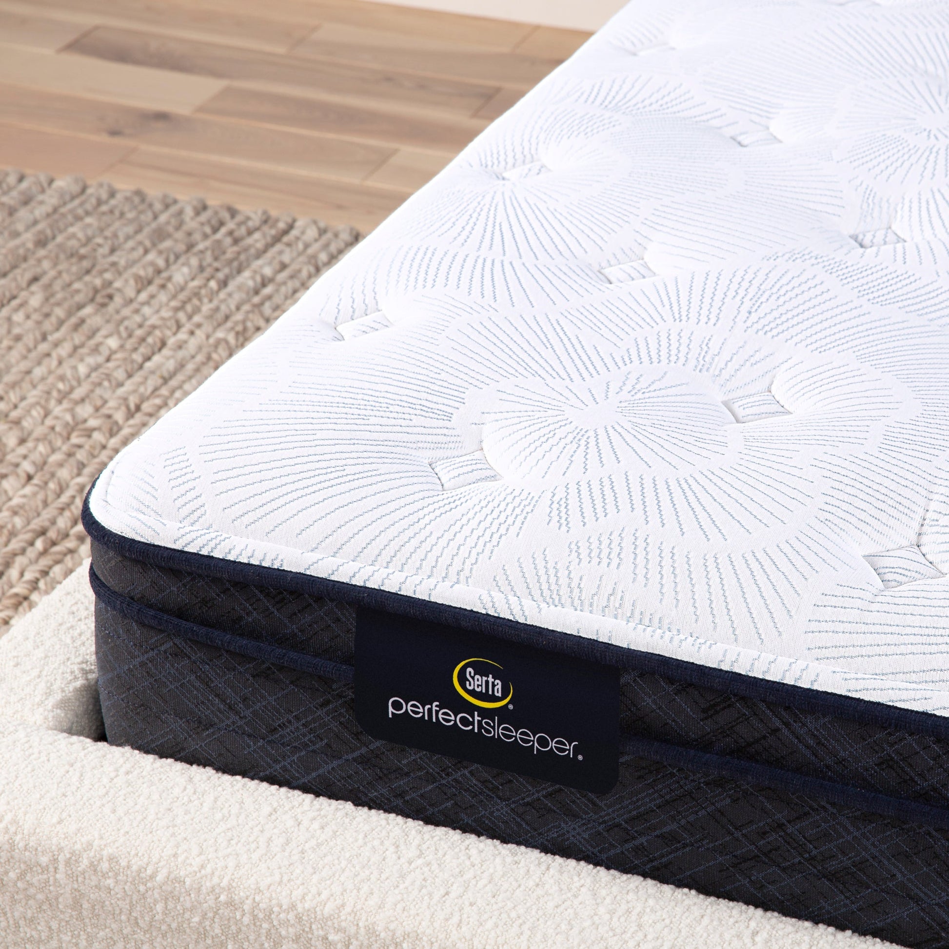 Corner detail of a Serta Perfect Sleeper plush euro top mattress||feel: plush euro top||level: standard