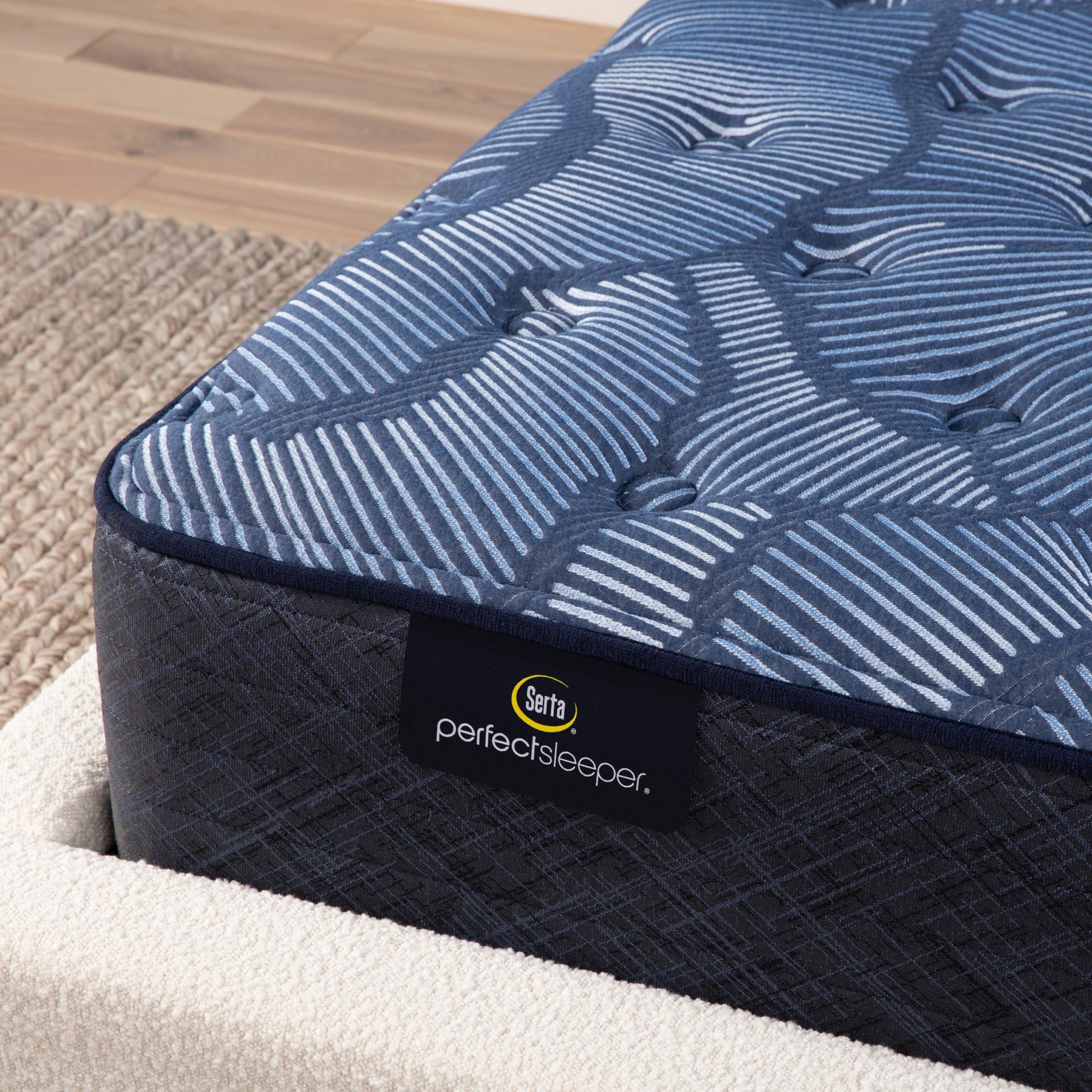 Corner detail of a Serta Perfect Sleeper plush mattress||feel: plush||level: ultimate