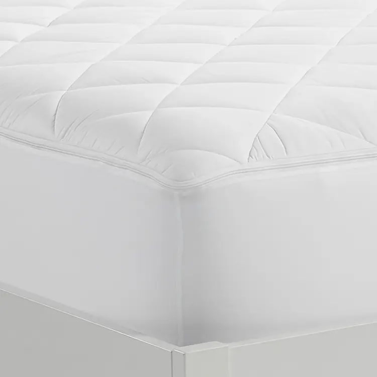 Serta Air Dry Extra Comfort Plus Mattress Pad on the corner of a mattress