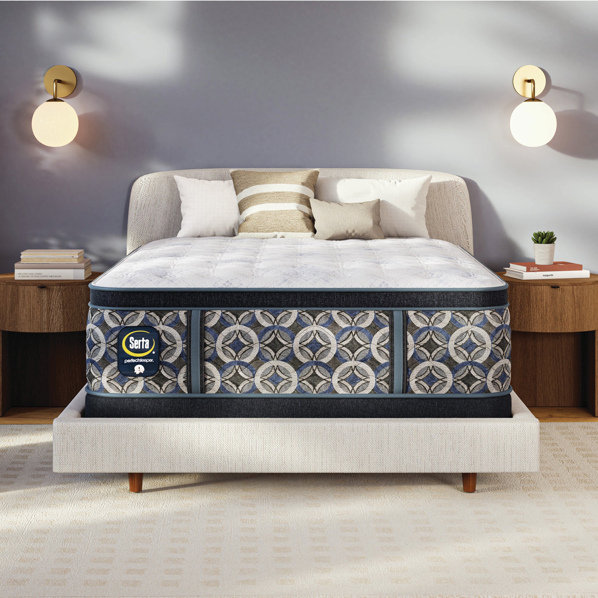 Serta perfect sleeper firm mattress on a bed in a bedroom setting with neutral decor.