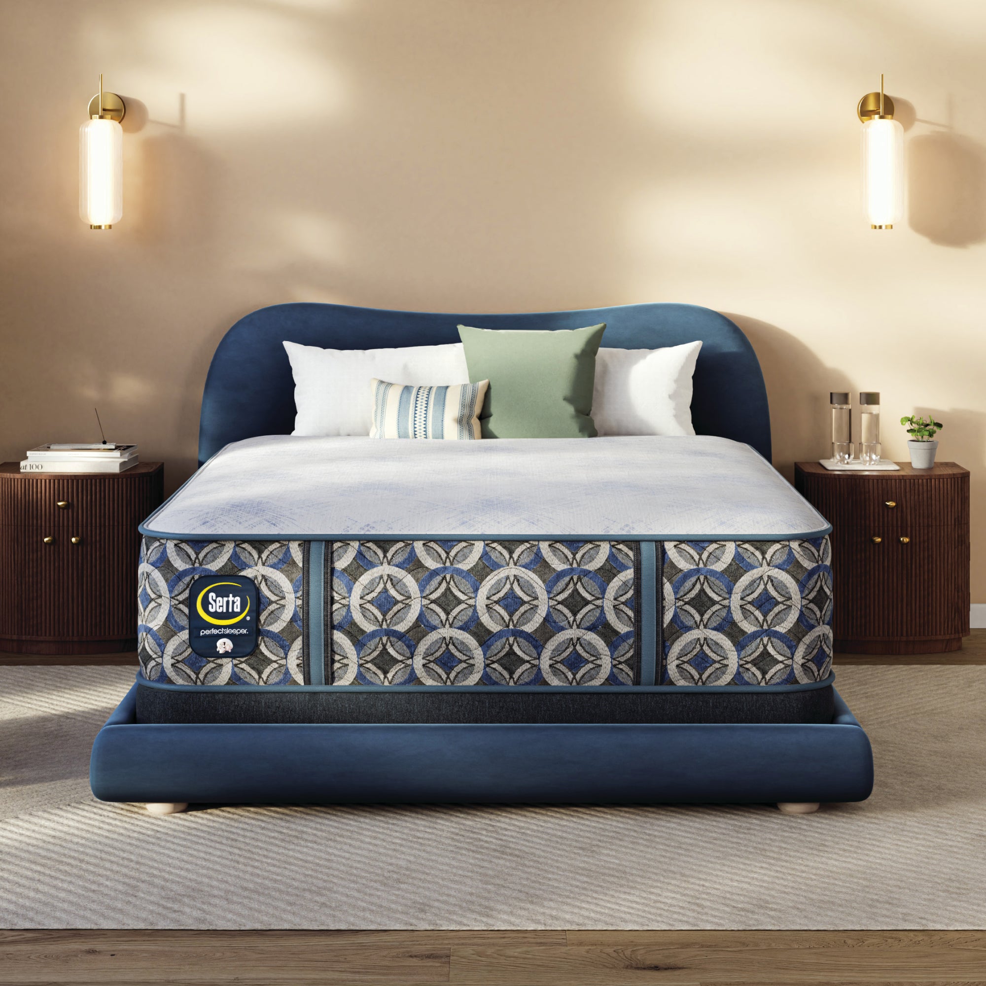 Blue upholstered bed with a Serta perfect sleeper hybrid medium mattress in a bedroom setting