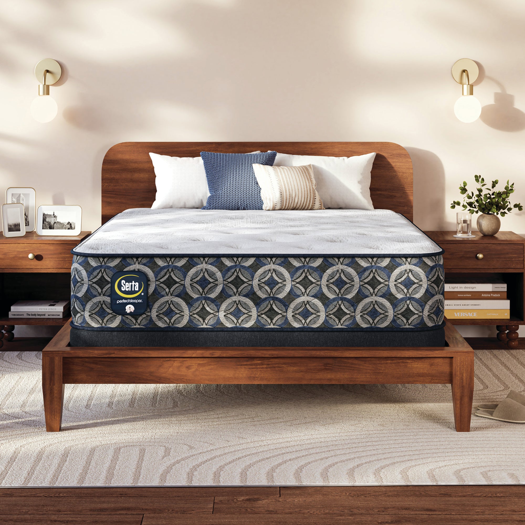 Serta Perfect Sleeper medium mattress on a wooden bed frame with pillows in a bedroom setting